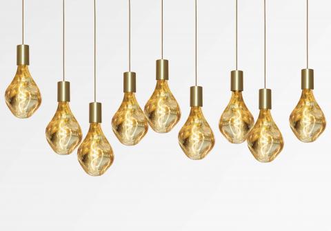 ARTEMIS 9 # in brushed brass with nine gold bulbs